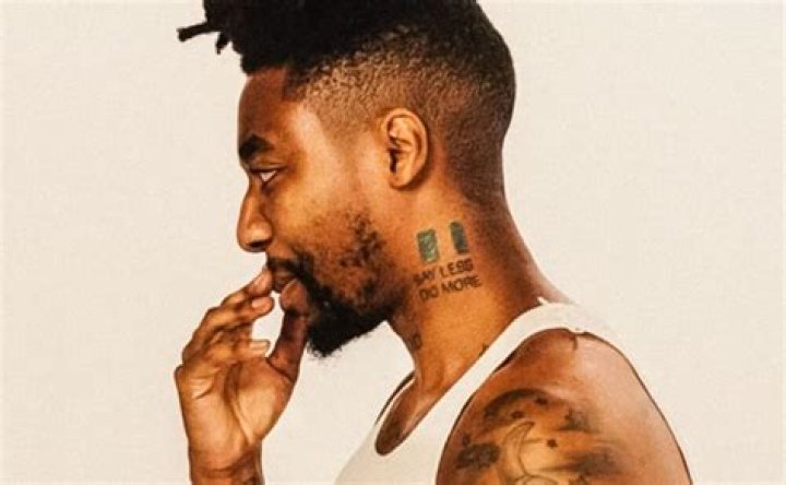 Canadian Rapper Dax Makes Tattoo Of Nigeria Flag On His Neck